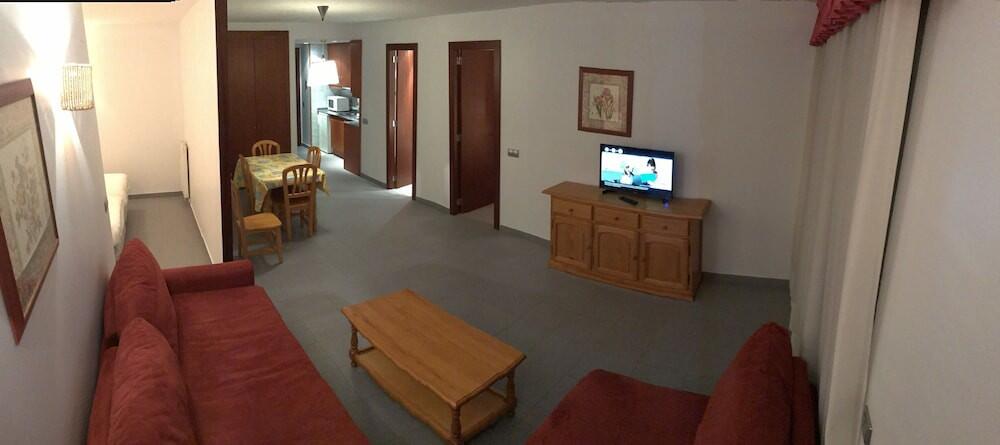 Foto de una habitación de Apartamentos Turísticos Roc Del Castell