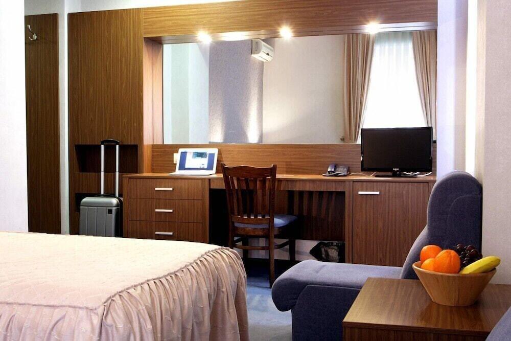 Foto de una habitación de DITER Hotel