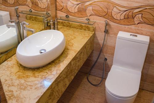 Foto del baño de Sands Grand Hotel
