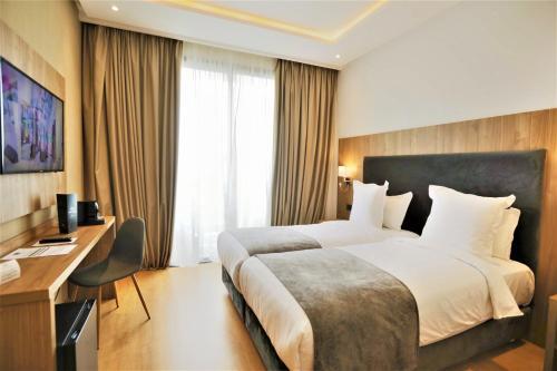 Foto de una habitación de Dominium Hotel