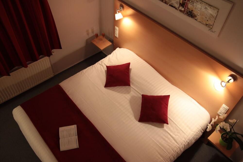 Foto de una habitación de Carré Py&amp;#039; Hôtel