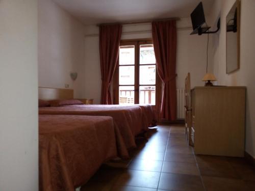 Foto de una habitación de Hotel Saloria