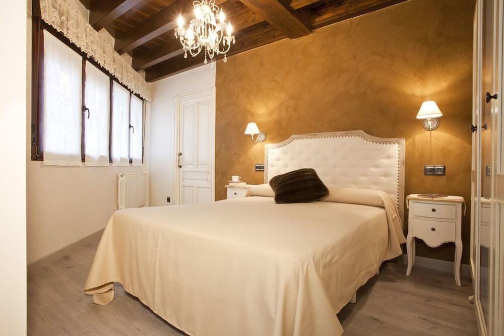 Foto de una habitación de Apartamentos El Aramo Asturias