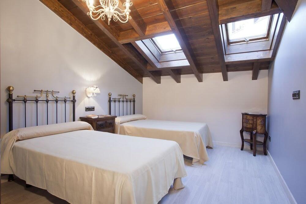 Foto de una habitación de Apartamentos El Aramo Asturias