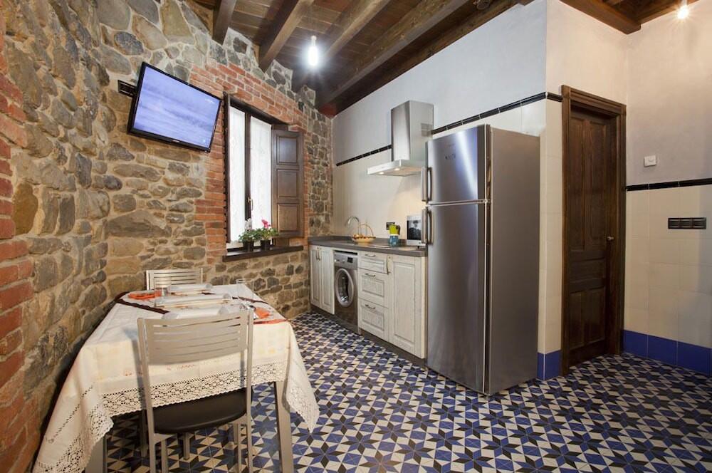 Foto de una habitación de Apartamentos El Aramo Asturias