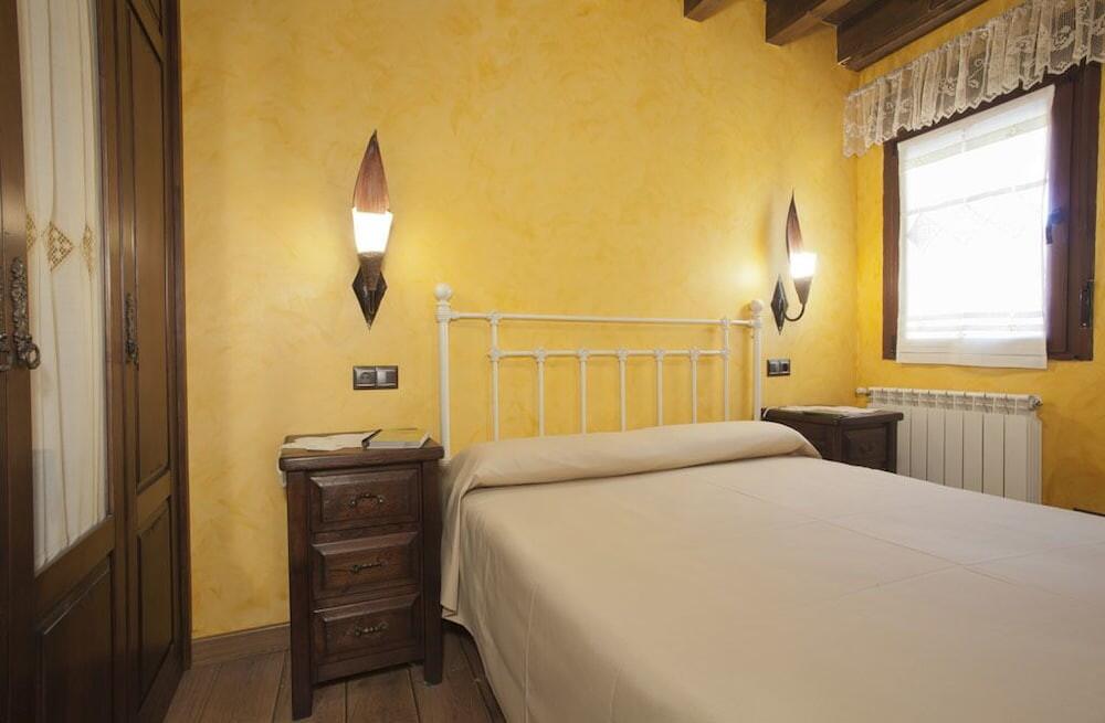 Foto de una habitación de Apartamentos El Aramo Asturias