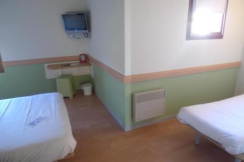 Foto de una habitación de Hotel ibis budget Narbonne Sud A9/A61