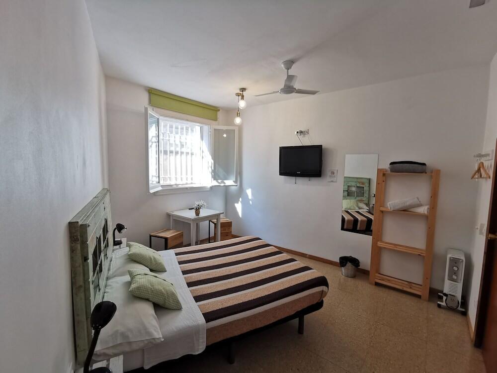 Foto de una habitación de Mucha Masia Hostel Rural-Urbà