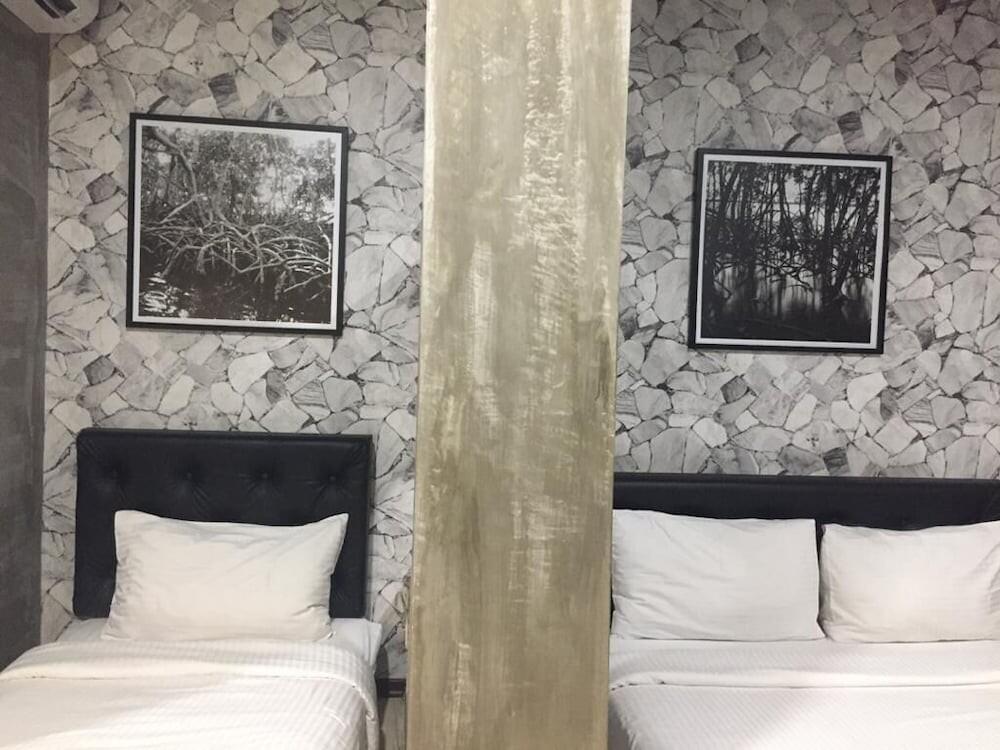 Foto de una habitación de Big Banana Hotel