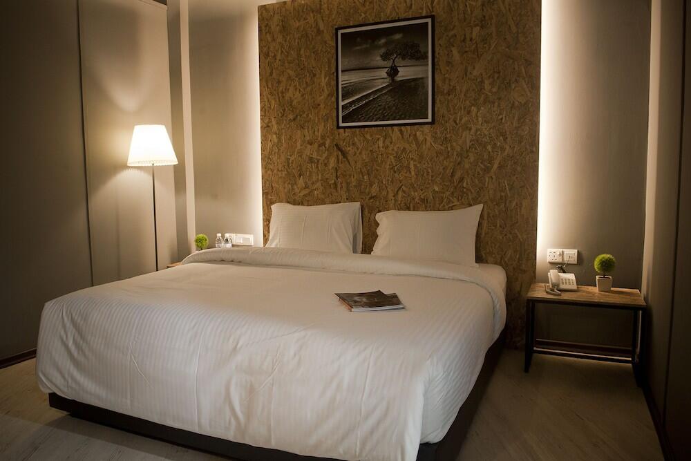 Foto de una habitación de Big Banana Hotel