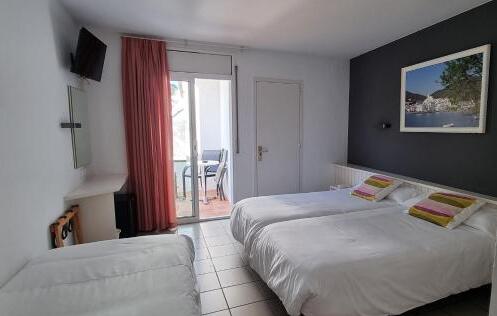 Foto de una habitación de Hotel S´Aguarda
