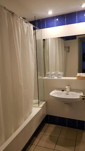 Foto del baño de Hotel S´Aguarda