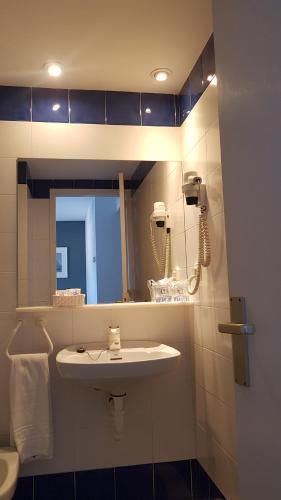 Foto del baño de Hotel S´Aguarda