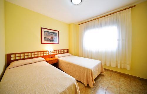 Foto de una habitación de Apartamentos Bali Orange Costa