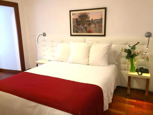 Foto de una habitación de Hotel Del Lago