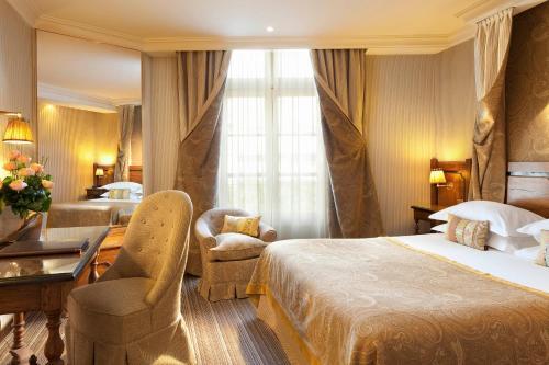 Foto de una habitación de Hotel Au Manoir Saint Germain