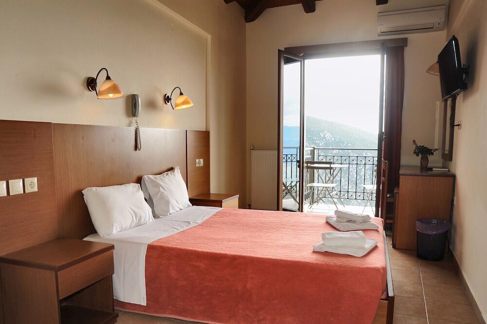 Foto de una habitación de Hotel Castri
