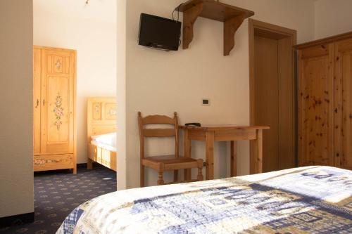 Foto de una habitación de Hotel Garnì Nès Crépes