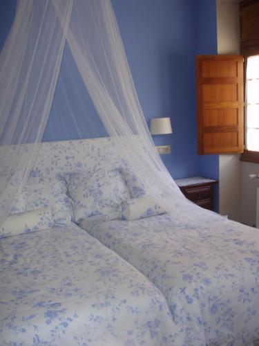Foto de una habitación de Apartamentos Casa María Juanín