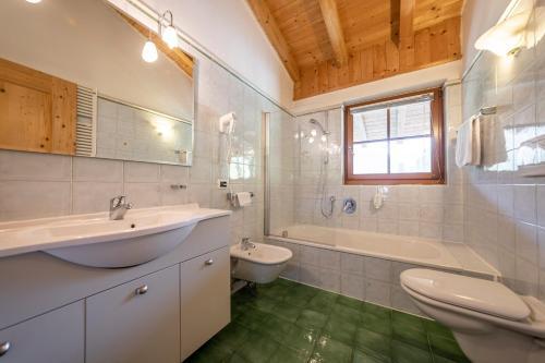 Foto de una habitación de Hotel Dolomiti