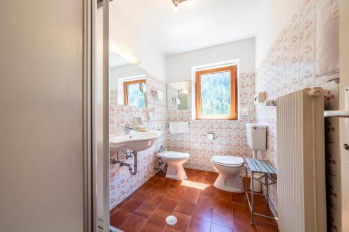 Foto de una habitación de Hotel Dolomiti