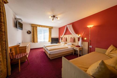 Foto de una habitación de Hotel Dolomiti
