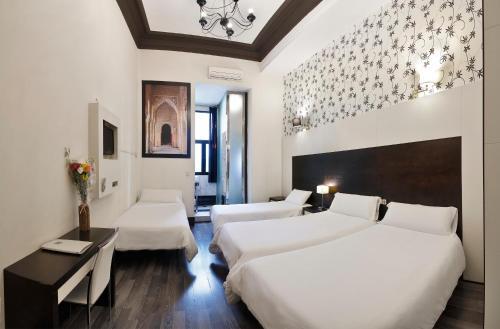 Foto de una habitación de Alhambra Suites