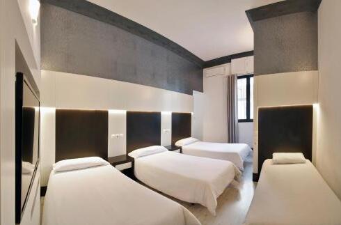 Foto de una habitación de Alhambra Suites