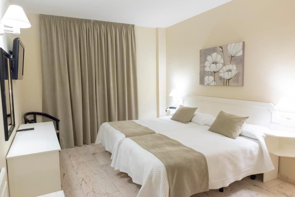 Foto de una habitación de Hotel Ramomar