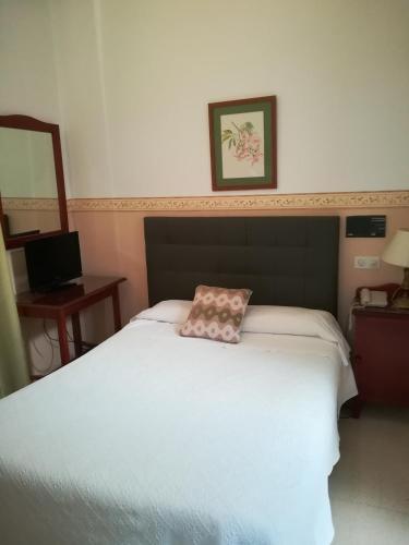 Foto de una habitación de Nuevo Hotel