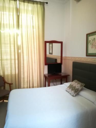 Foto de una habitación de Nuevo Hotel