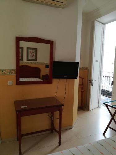Foto de una habitación de Nuevo Hotel