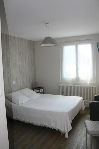 Foto de una habitación de Hotel Bon-Séjour