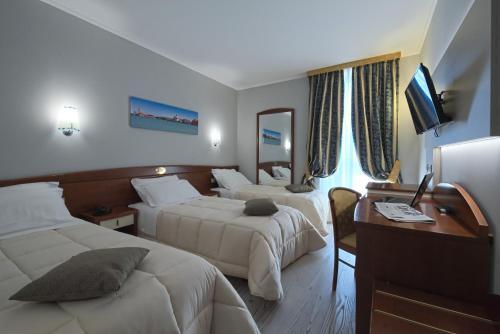 Foto de una habitación de Noventa Hotel