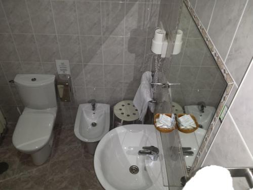 Foto del baño de Hotel Camargo