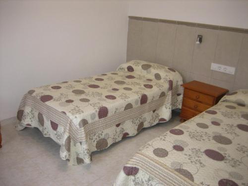 Foto de una habitación de Apartamentos Can Torrents
