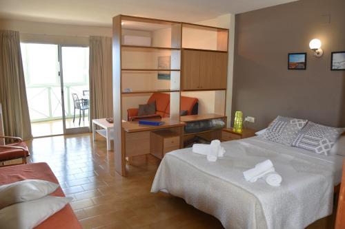 Foto de una habitación de Apartamentos Acuario