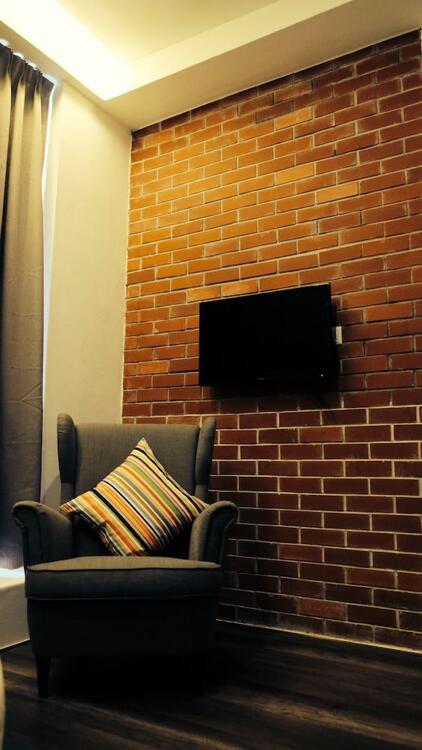 Foto de una habitación de Roomies Suites