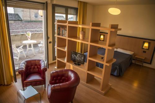 Foto de una habitación de Hotel Masini