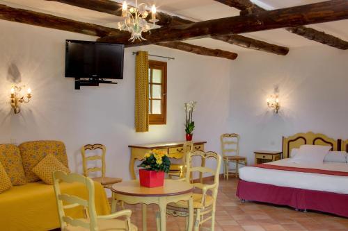 Foto de una habitación de Hotel Le Mas Des Sables