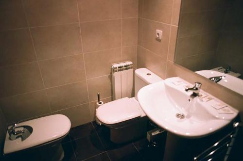 Foto del baño de Apartamentos Auhabitat Zaragoza, edificio de apartamentos turísticos con facilidad de parking