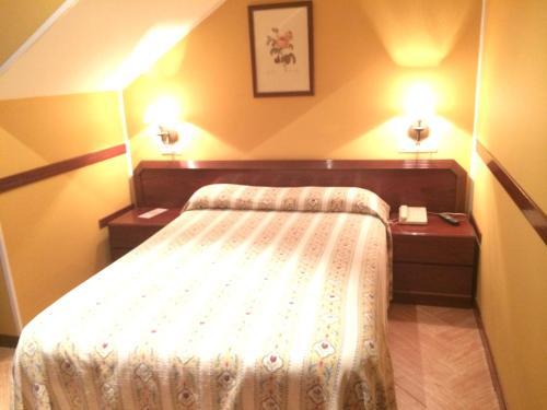 Foto de una habitación de Hotel Nueva Allandesa