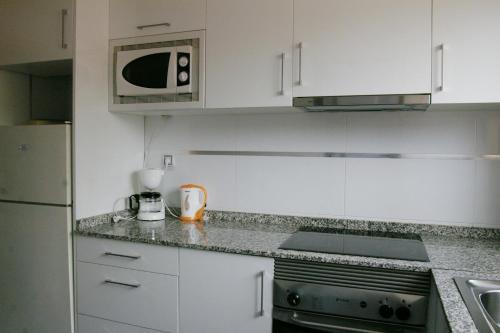 Foto de una habitación de Apartamentos Torre Don Vicente - Arca Rent