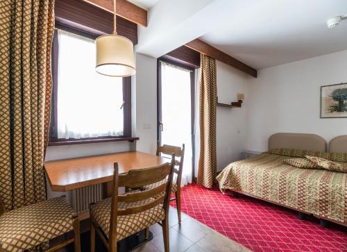 Foto de una habitación de Aparthotel Residence Lastei