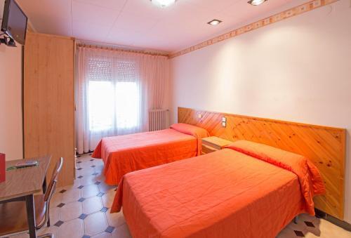 Foto de una habitación de Hotel Avenida