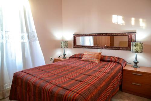 Foto de una habitación de Apartamentos Sevilla