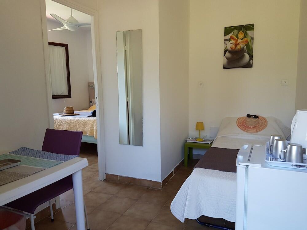 Foto de una habitación de Hotel Punta e Mare