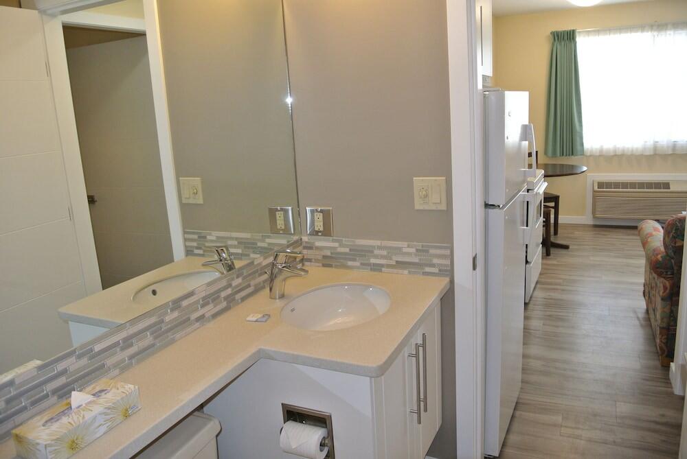 Foto del baño de Hotel Siesta Suites