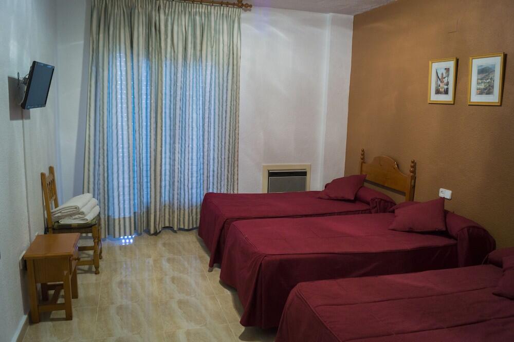 Foto de una habitación de Hotel Muñoz