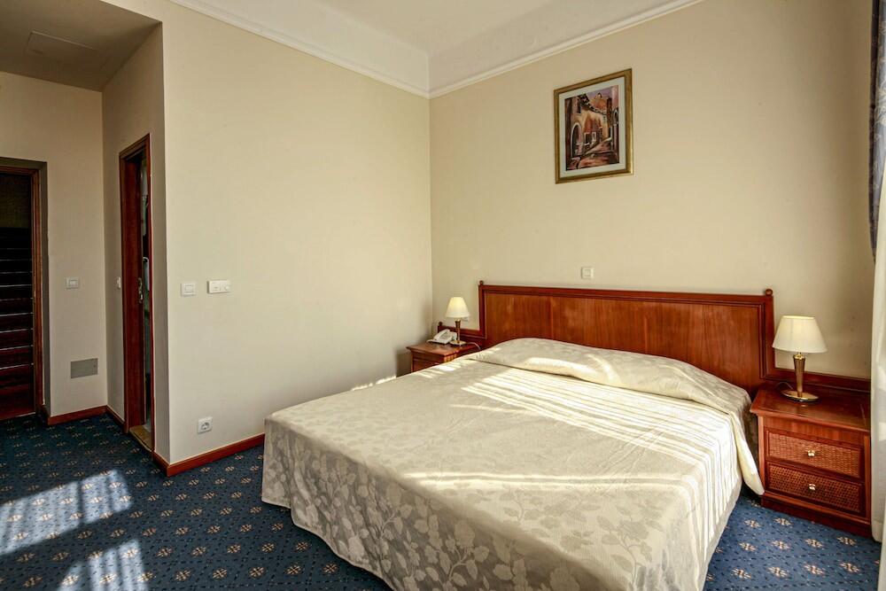 Foto de una habitación de Hotel Lovran